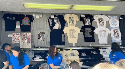 The Taylor Swift Eras Tour merch truck has all the show exclusive merch like the blue crewneck and q...