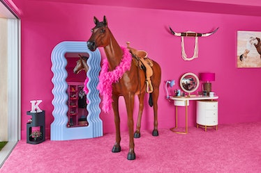 The bedroom at the Barbie Malibu DreamHouse has a life-size plastic horse. 