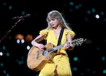 Taylor Swift performs onstage during the "Eras Tour"